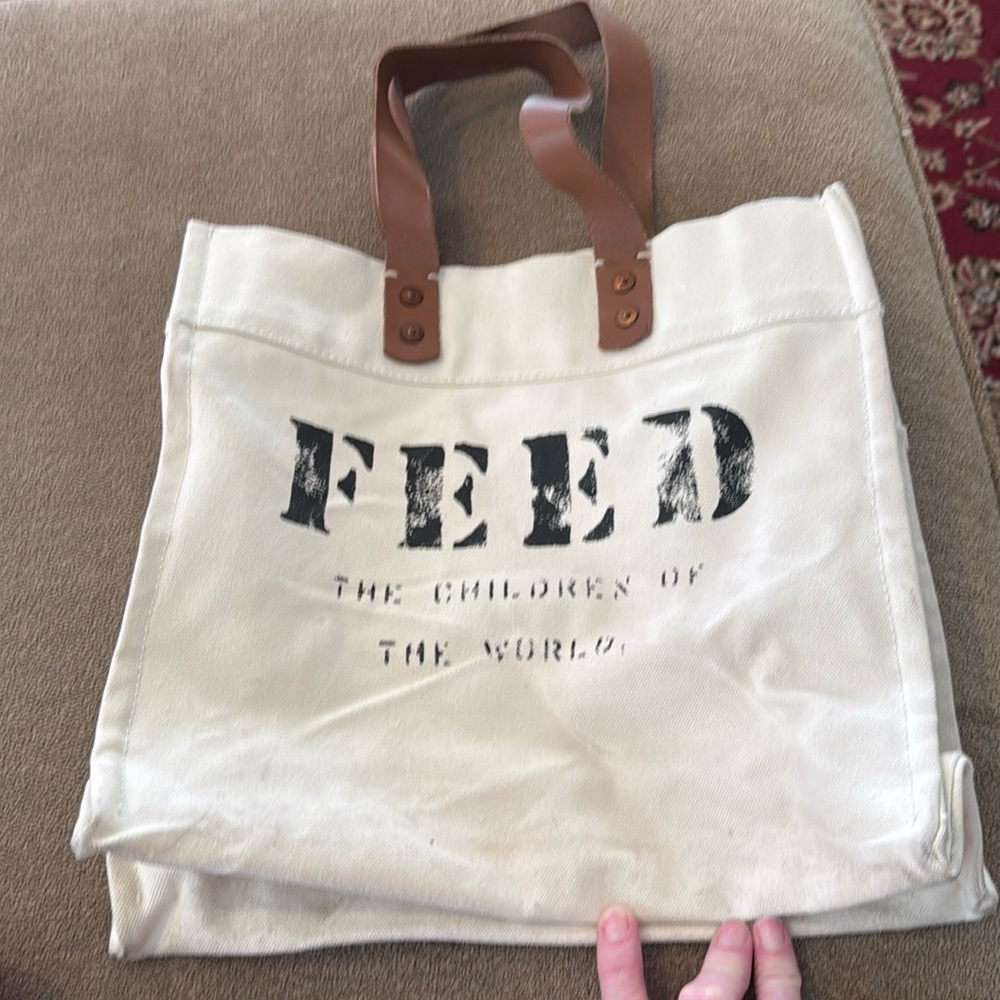 The FEED The Children of the World Canvas/Leather Tote Bag (TD)